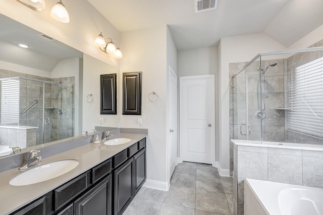2811 Ridgecliff Ct, Conroe, TX 77301 - full bath featuring a shower stall, double vanity, a garden tub, lofted ceiling, and baseboards