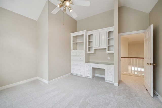 6010 Maple Knob Ct, Kingwood, TX 77345 - unfurnished office featuring lofted ceiling, a ceiling fan, built in study area, and light colored carpet