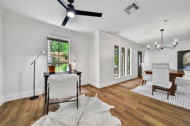 3022 Grove Terrace Dr, Houston, TX 77345 - office featuring ornamental molding, baseboards, a ceiling fan, a chandelier, and wood finished floors