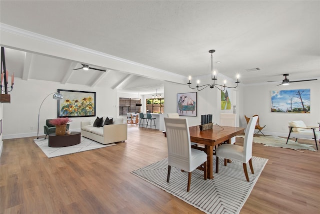 3022 Grove Terrace Dr, Houston, TX 77345 - dining space featuring a chandelier, beamed ceiling, light wood-type flooring, baseboards, and a ceiling fan