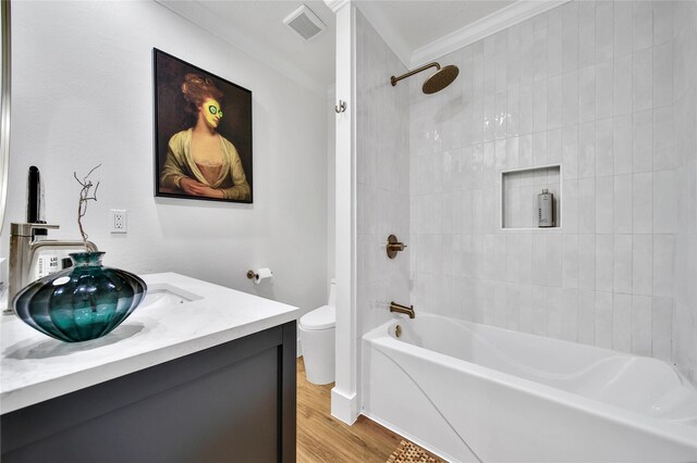 3022 Grove Terrace Dr, Houston, TX 77345 - full bathroom with toilet, crown molding, vanity, wood finished floors, and shower / tub combination