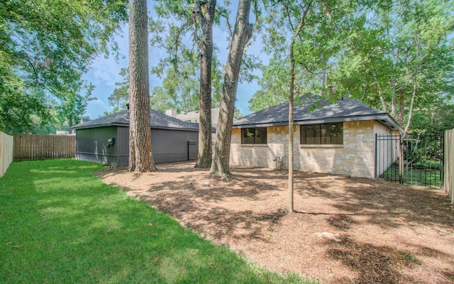3022 Grove Terrace Dr, Houston, TX 77345 - rear view of property featuring brick siding and roof with shingles