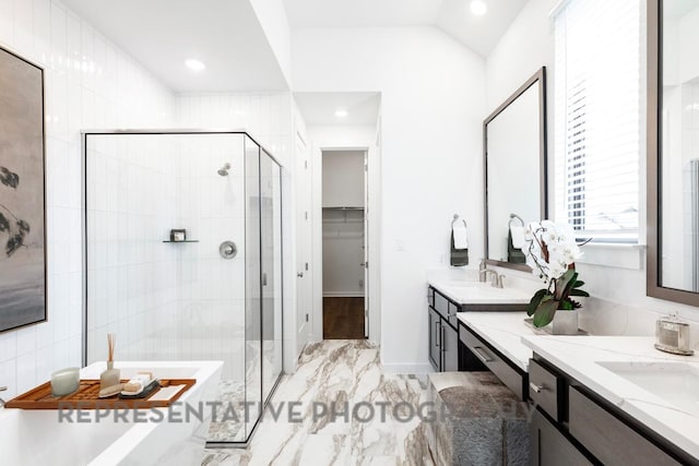 4315 Southpoint Way, Fulshear, TX 77441 - bathroom featuring a stall shower, two vanities, a soaking tub, recessed lighting, and a spacious closet