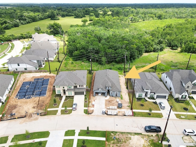4315 Southpoint Way, Fulshear, TX 77441 - aerial perspective of suburban area featuring a forest