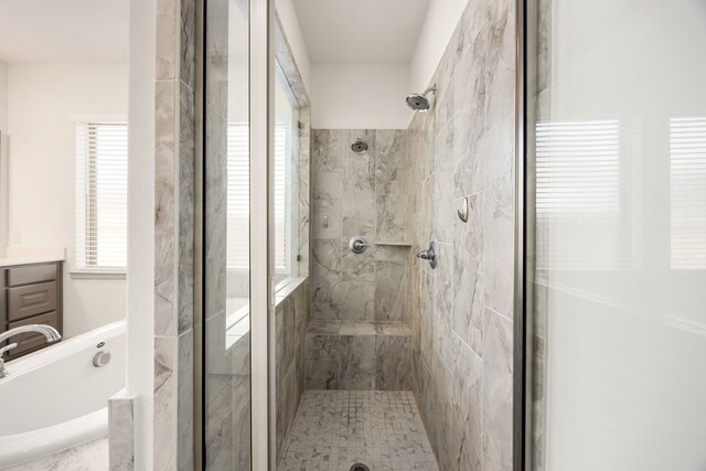 2326 Bristlegrass Dr, Katy, TX 77494 - bathroom featuring a marble finish shower, a bath, and vanity