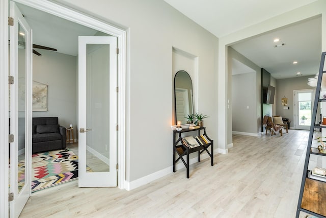9715 Highland Pointe Dr, Needville, TX 77461 - corridor with wood finished floors, baseboards, french doors, and recessed lighting