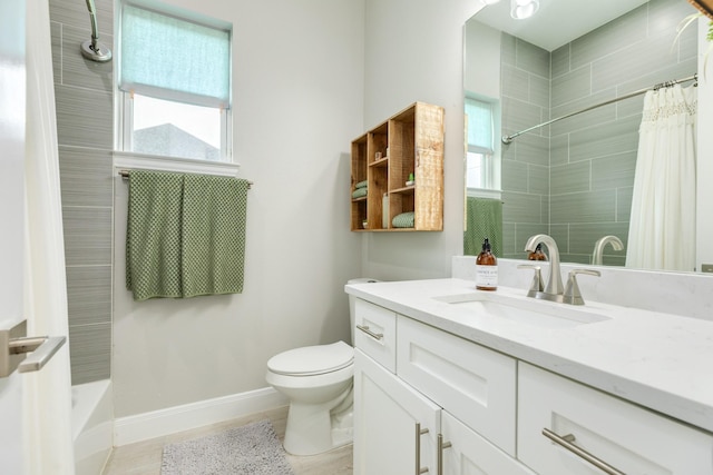9715 Highland Pointe Dr, Needville, TX 77461 - full bath with vanity, plenty of natural light, toilet, and baseboards