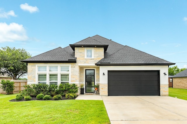 9715 Highland Pointe Dr, Needville, TX 77461 - view of front of property with a garage, stone siding, a shingled roof, and concrete driveway