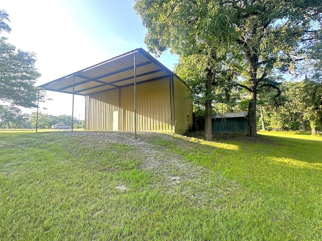 113 Fm 3454th Rd, Huntsville, TX 77320 - view of pole building featuring a yard