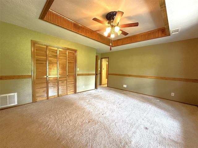 113 Fm 3454th Rd, Huntsville, TX 77320 - carpeted spare room with a raised ceiling, ceiling fan, and baseboards