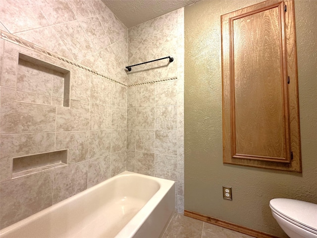 113 Fm 3454th Rd, Huntsville, TX 77320 - full bath with toilet, tile patterned flooring, washtub / shower combination, and baseboards