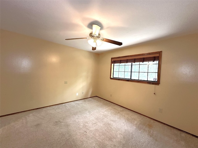 113 Fm 3454th Rd, Huntsville, TX 77320 - carpeted empty room with a ceiling fan and baseboards