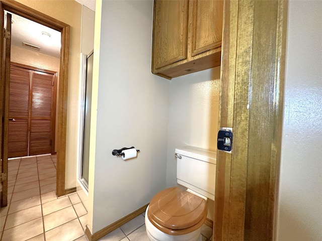 113 Fm 3454th Rd, Huntsville, TX 77320 - full bath with toilet, a shower stall, and tile patterned flooring