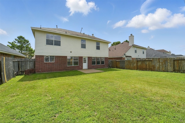 6419 Bonnie Chase Ln, Katy, TX 77449 - back of house with brick siding and a patio