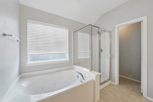 6419 Bonnie Chase Ln, Katy, TX 77449 - bathroom featuring a stall shower, a tub with jets, plenty of natural light, tile patterned floors, and lofted ceiling