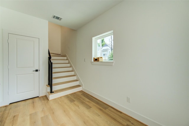 4045 Buck St, Houston, TX 77020 - stairs with wood finished floors and baseboards