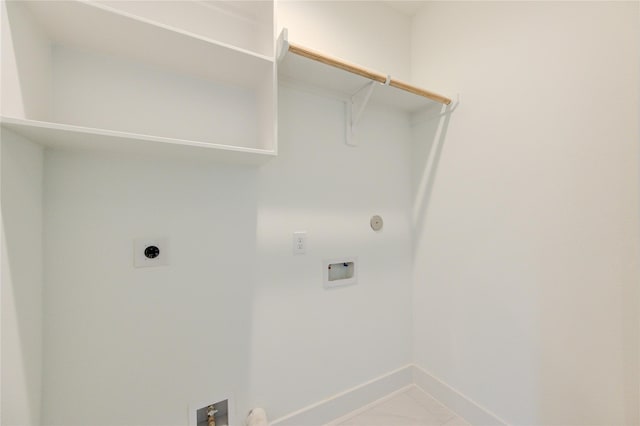 4045 Buck St, Houston, TX 77020 - laundry area featuring hookup for a washing machine, hookup for an electric dryer, baseboards, and gas dryer hookup