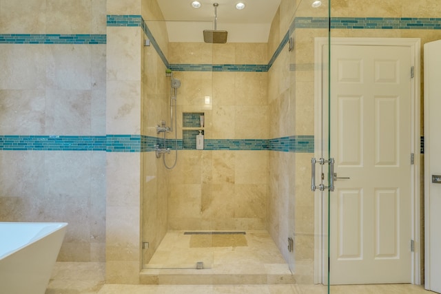 4315 Lago Viento, Austin, TX 78734 - full bathroom with a shower stall and a soaking tub