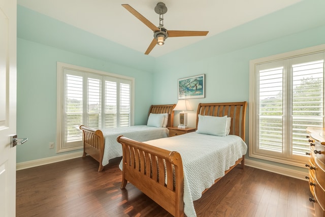 4315 Lago Viento, Austin, TX 78734 - bedroom featuring baseboards, dark wood-style flooring, and ceiling fan