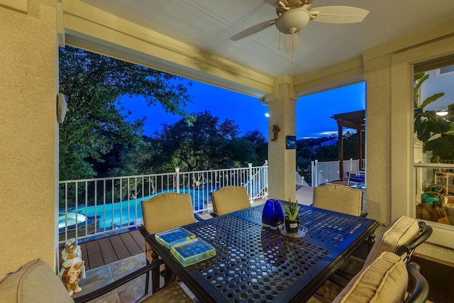 4315 Lago Viento, Austin, TX 78734 - wooden deck featuring outdoor dining space and a ceiling fan