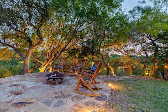 4315 Lago Viento, Austin, TX 78734 - view of patio featuring an outdoor fire pit