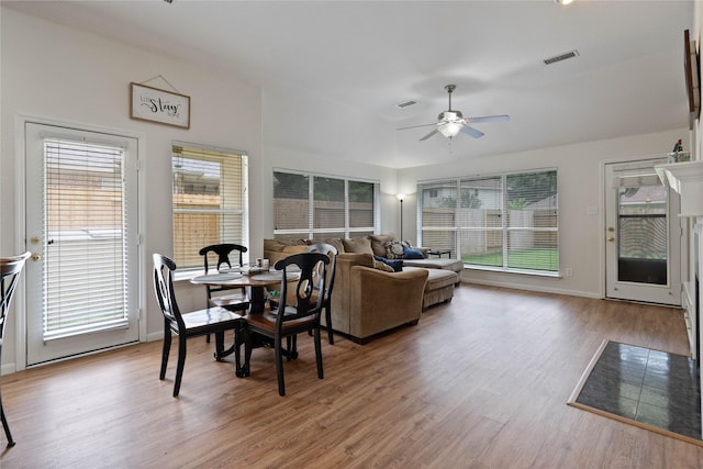 23 Drifting Shadows Cir, Conroe, TX 77385 - dining room featuring a ceiling fan, wood finished floors, and baseboards