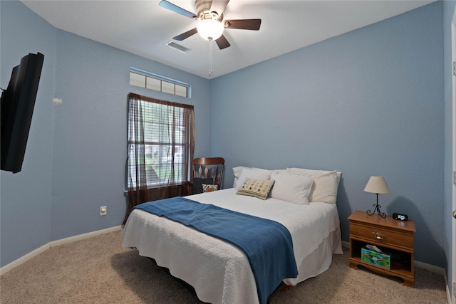 23 Drifting Shadows Cir, Conroe, TX 77385 - carpeted bedroom with baseboards and a ceiling fan