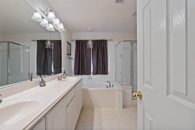 23 Drifting Shadows Cir, Conroe, TX 77385 - bathroom with a stall shower, a bath, double vanity, and tile patterned flooring