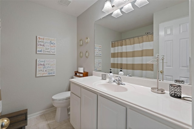 23 Drifting Shadows Cir, Conroe, TX 77385 - full bath with toilet, tile patterned flooring, vanity, baseboards, and curtained shower
