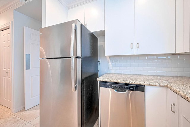 651 Bering Dr Unit 1101, Houston, TX 77057 - kitchen featuring stainless steel appliances, white cabinets, tasteful backsplash, light stone countertops, and light tile patterned flooring
