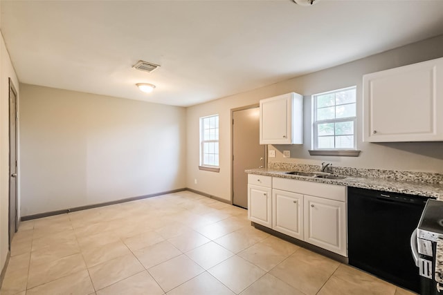 3313 Chestershire Dr, Pasadena, TX 77503 - kitchen featuring black dishwasher, plenty of natural light, white cabinetry, and a sink