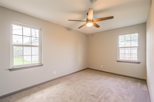 3313 Chestershire Dr, Pasadena, TX 77503 - empty room featuring light colored carpet, ceiling fan, and baseboards