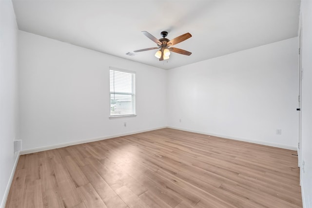 21114 Echo Manor Dr, Hockley, TX 77447 - spare room featuring a ceiling fan and light wood-type flooring