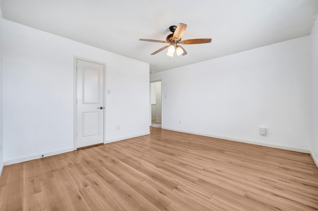 21114 Echo Manor Dr, Hockley, TX 77447 - unfurnished room featuring light wood finished floors and a ceiling fan