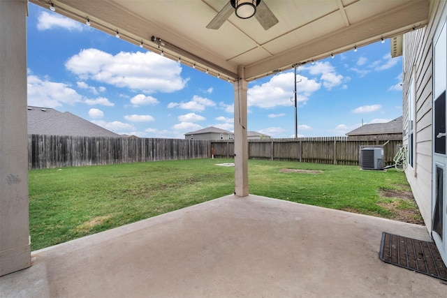 21114 Echo Manor Dr, Hockley, TX 77447 - fenced backyard featuring a ceiling fan and a patio
