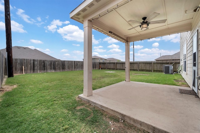 21114 Echo Manor Dr, Hockley, TX 77447 - fenced backyard featuring a ceiling fan and a patio