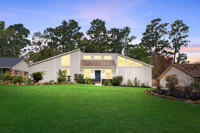 44 Foy Martin Dr, Conroe, TX 77304 - mid-century inspired home featuring a lawn