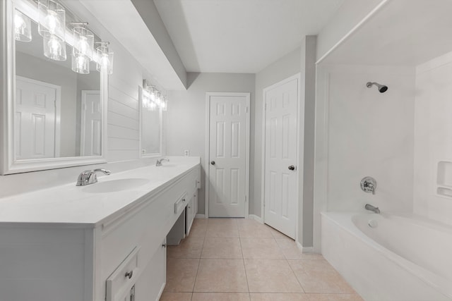 44 Foy Martin Dr, Conroe, TX 77304 - full bath with double vanity, tile patterned floors, and washtub / shower combination