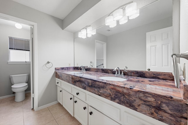 44 Foy Martin Dr, Conroe, TX 77304 - bathroom featuring double vanity and tile patterned flooring