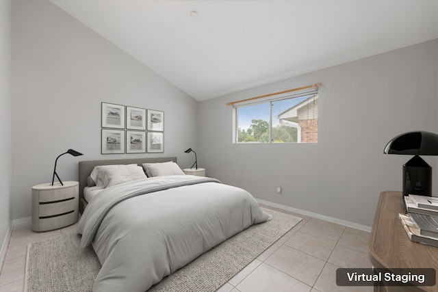 44 Foy Martin Dr, Conroe, TX 77304 - bedroom with lofted ceiling and light tile patterned floors