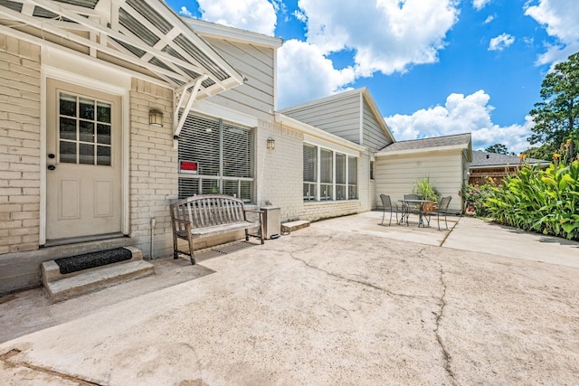 44 Foy Martin Dr, Conroe, TX 77304 - view of patio / terrace featuring outdoor dining area and entry steps