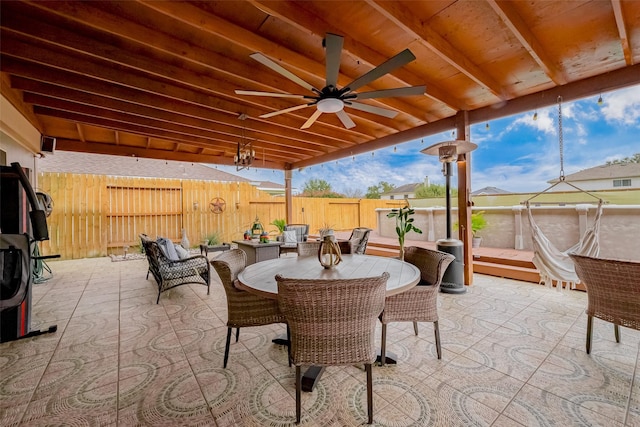 3126 Silverstag Trail Ln, Houston, TX 77073 - fenced backyard with a patio area, a ceiling fan, and outdoor dining area
