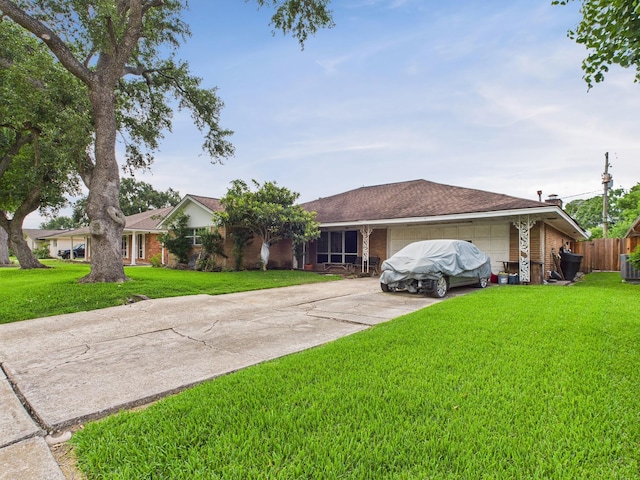8206 Dillon St, Houston, TX 77061 - single story home featuring a garage, brick siding, and concrete driveway