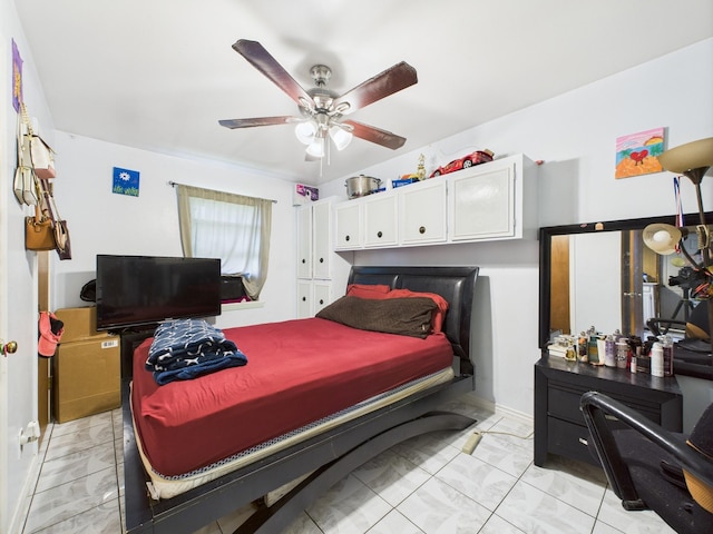 8206 Dillon St, Houston, TX 77061 - bedroom with light marble finish flooring and a ceiling fan