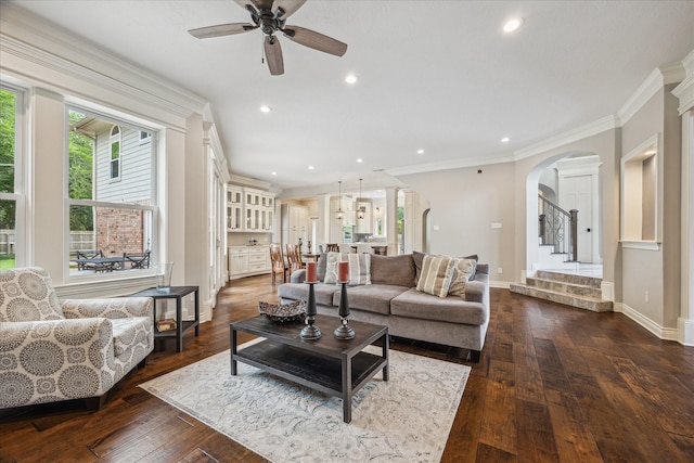 1902 Carriage Creek Ln, Friendswood, TX 77546 - living room featuring ceiling fan, arched walkways, stairway, crown molding, and recessed lighting