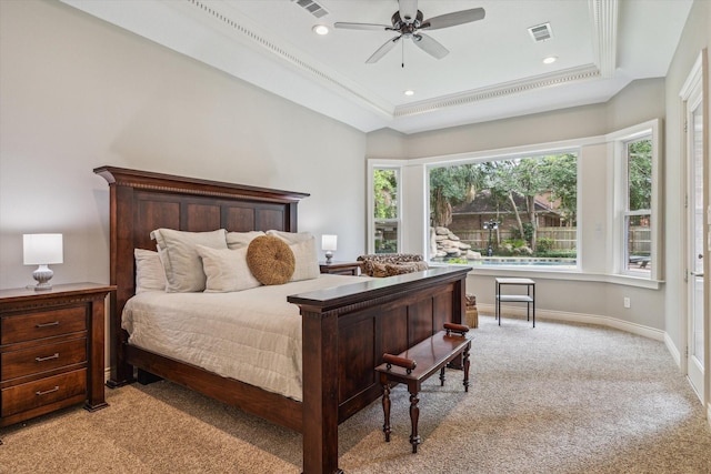 1902 Carriage Creek Ln, Friendswood, TX 77546 - bedroom with light carpet, a tray ceiling, baseboards, recessed lighting, and a ceiling fan