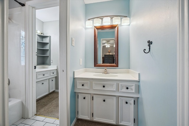 1902 Carriage Creek Ln, Friendswood, TX 77546 - full bath with vanity, tile patterned flooring, and  shower combination