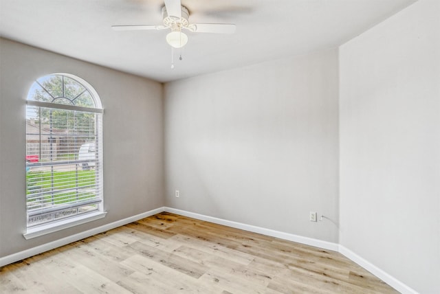 19822 Laurel Trail Dr, Cypress, TX 77433 - empty room featuring wood finished floors, baseboards, and a ceiling fan