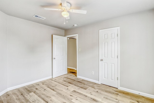 19822 Laurel Trail Dr, Cypress, TX 77433 - unfurnished bedroom with wood finished floors, baseboards, and a ceiling fan