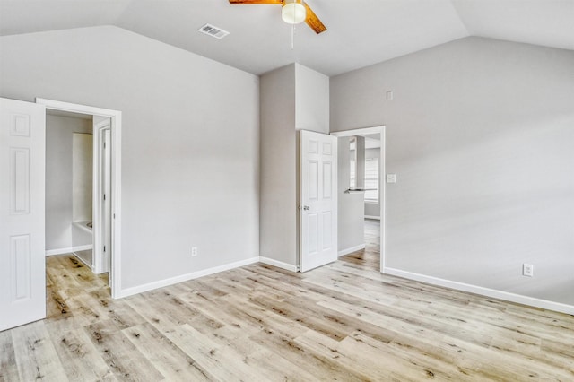 19822 Laurel Trail Dr, Cypress, TX 77433 - unfurnished bedroom featuring vaulted ceiling, light wood-type flooring, baseboards, and a ceiling fan